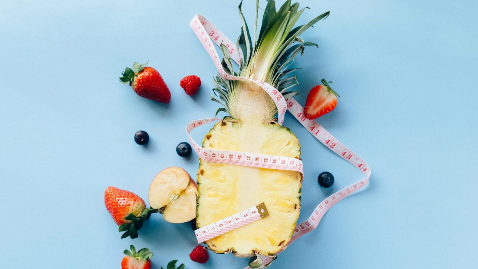 Fruit Wrapped in Measuring Tape